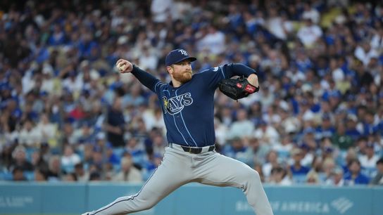 Tampa Bay Rays starting pitcher Drew Rasmussen (57) throws a pitch during the third inning against the Los Angeles Dodgers at Dodger Stadium. Tampa Bay Rays starting pitcher Drew Rasmussen (57) throws a pitch during the third inning against the Los Angeles Dodgers at Dodger Stadium.
