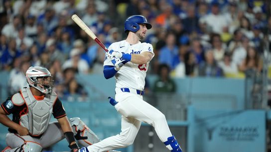 Los Angeles Dodgers right fielder Kyle Tucker (23) bats as Baltimore Orioles catcher Samuel Basallo (29) watches at Dodger Stadium. Los Angeles Dodgers right fielder Kyle Tucker (23) bats as Baltimore Orioles catcher Samuel Basallo (29) watches at Dodger Stadium.