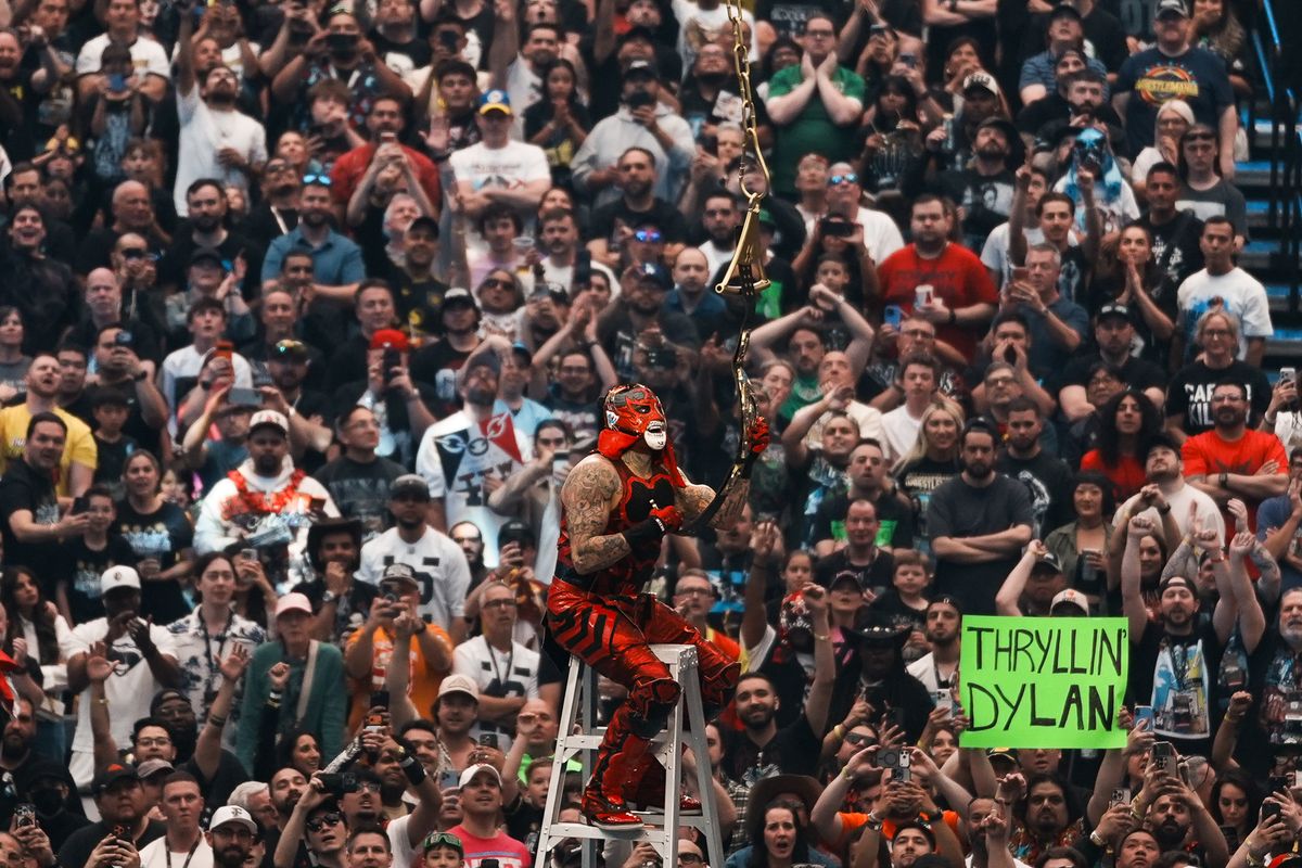 WWE wrestler Penta claims victory by grabbing the championship belt in the Intercontinental Championship ladder match during WrestleMania 42 on Sunday April 19, 2026 at Allegiant Stadium. WWE wrestler Penta claims victory by grabbing the championship belt in the Intercontinental Championship ladder match during WrestleMania 42 on Sunday April 19, 2026 at Allegiant Stadium.