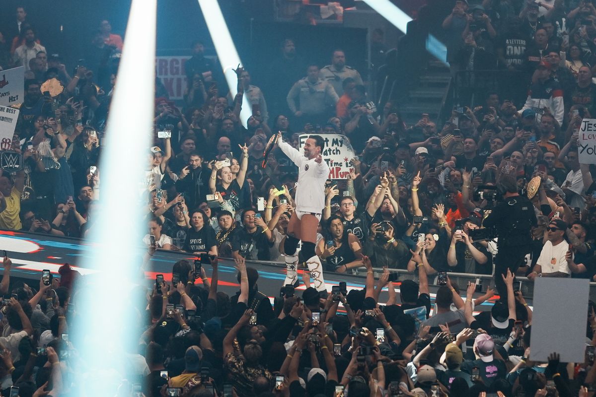 WWE wrestler CM Punk makes an entrance ahead of the WWE World Heavyweight Championship against Roman Reigns during WrestleMania 42 on Sunday April 19, 2026 at Allegiant Stadium. WWE wrestler CM Punk makes an entrance ahead of the WWE World Heavyweight Championship against Roman Reigns during WrestleMania 42 on Sunday April 19, 2026 at Allegiant Stadium.
