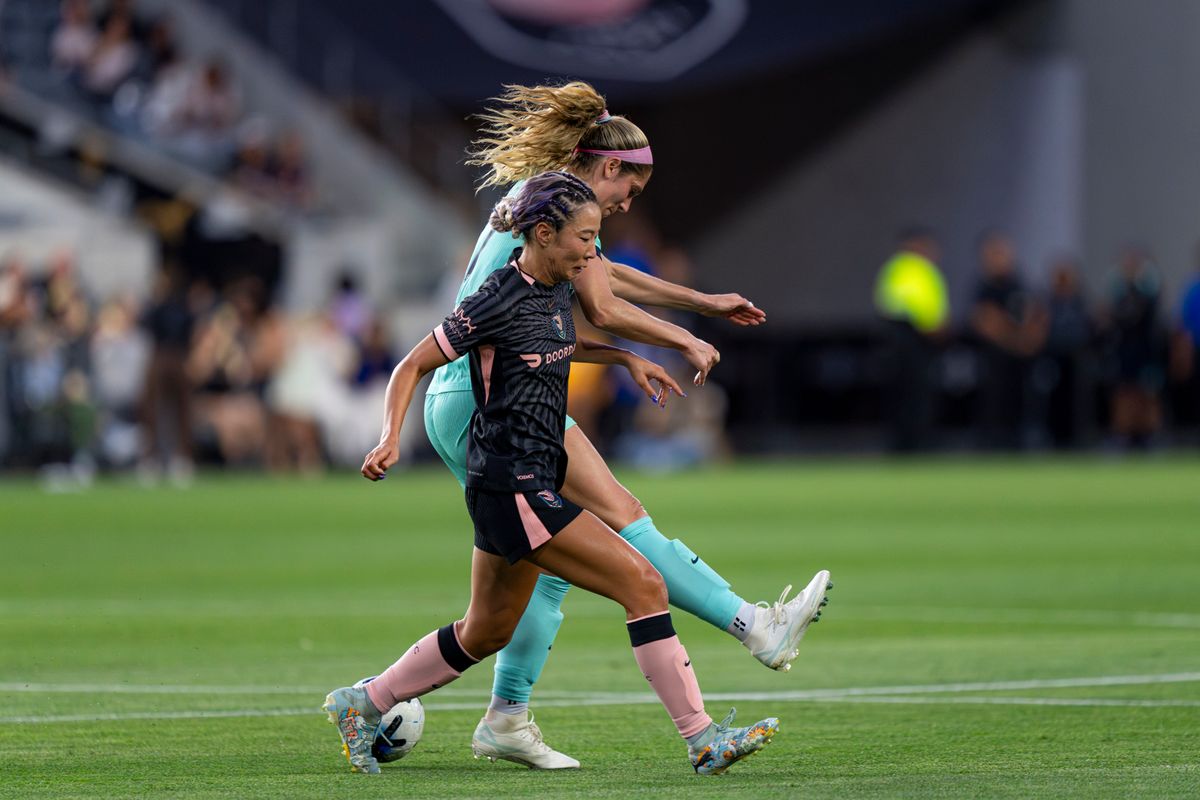 Angel City FC forward Jun Endo (18) covering an opposing defender during an NWSL game against the Kansas City Current on Wednesday May 20th, 2026 in Los Angeles, California. Angel City FC forward Jun Endo (18) covering an opposing defender during an NWSL game against the Kansas City Current on Wednesday May 20th, 2026 in Los Angeles, California.