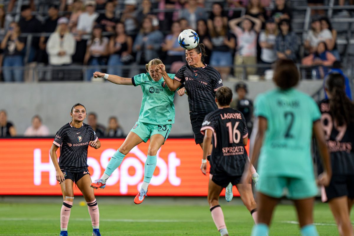 Angel City FC defender Emily Sams (6) fighting for a header during an NWSL game against the Kansas City Current on Wednesday May 20th, 2026 in Los Angeles, California. Angel City FC defender Emily Sams (6) fighting for a header during an NWSL game against the Kansas City Current on Wednesday May 20th, 2026 in Los Angeles, California.