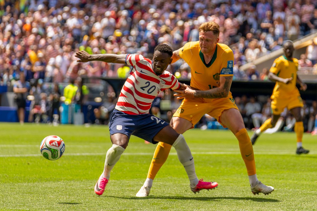 #20 Folarin Balogun of the United States keeps the ball away from the defender during a FIFA World Cup match against Australia, Friday June 19th, 2026 in Seattle, Washington. #20 Folarin Balogun of the United States keeps the ball away from the defender during a FIFA World Cup match against Australia, Friday June 19th, 2026 in Seattle, Washington.