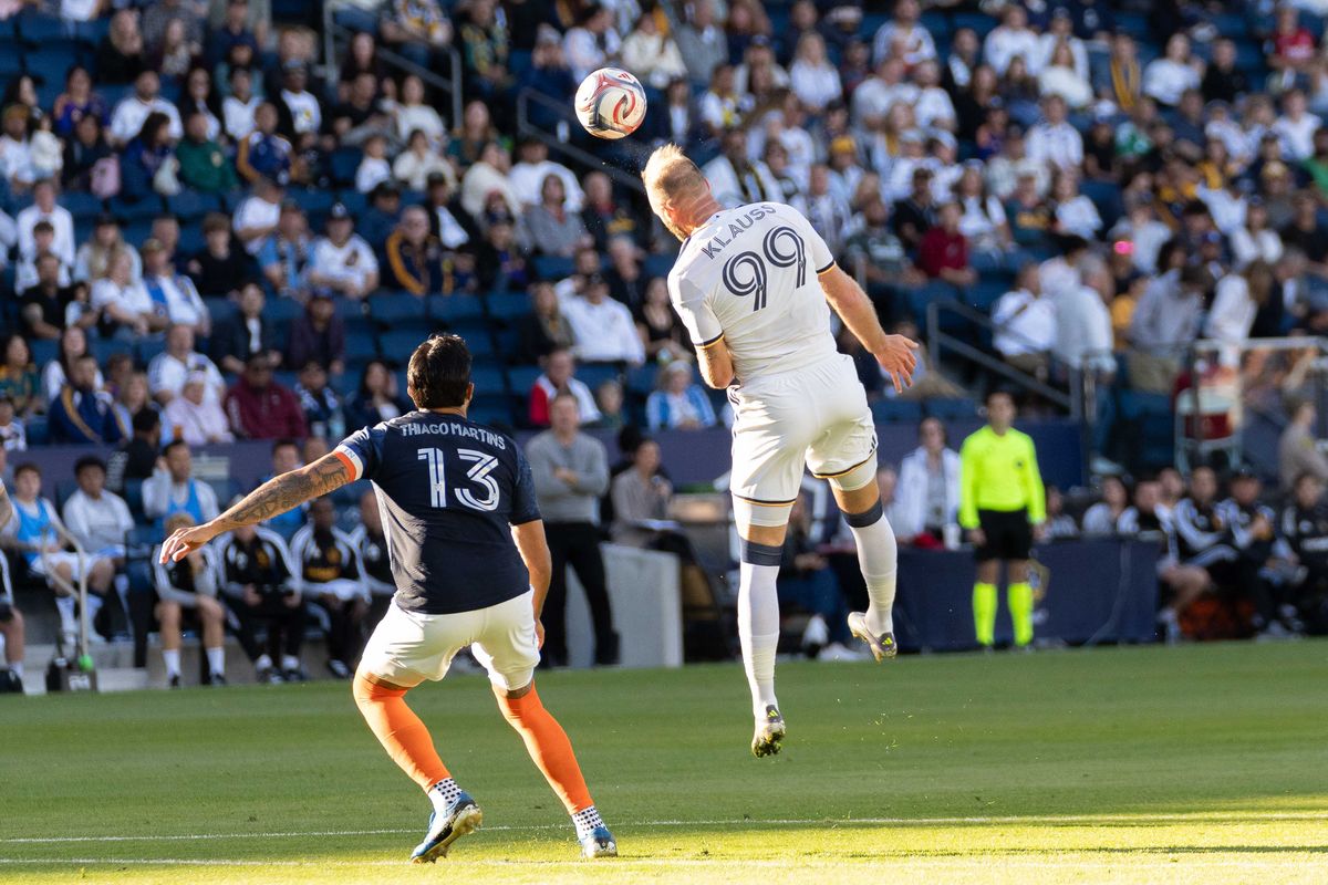 Los Angeles Galaxy forward Joao Klauss (99) goes for the header during an MLS game, Sunday February 22nd, 2026 in Carson, Calif