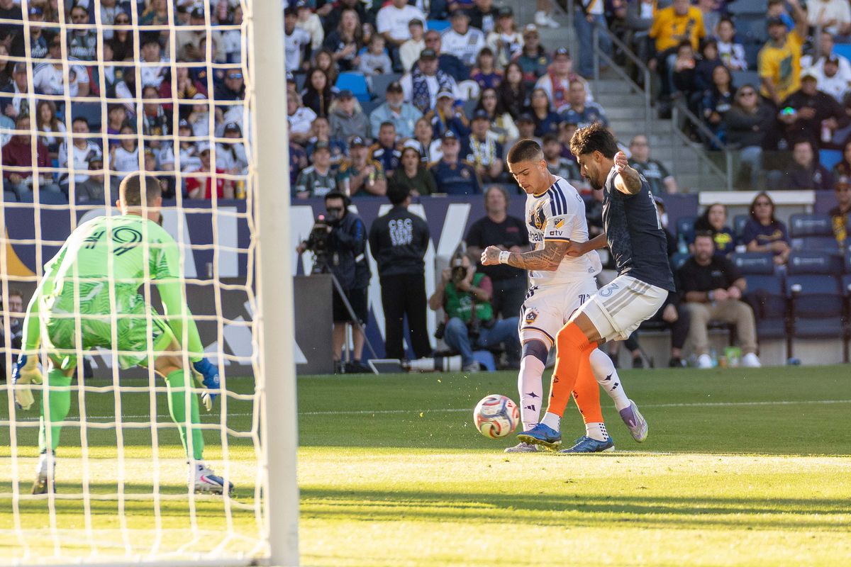 Los Angeles Galaxy forward Gabriel Pec (11) takes an attempt at goal during an MLS game, Sunday February 22nd, 2026 in Carson, Calif