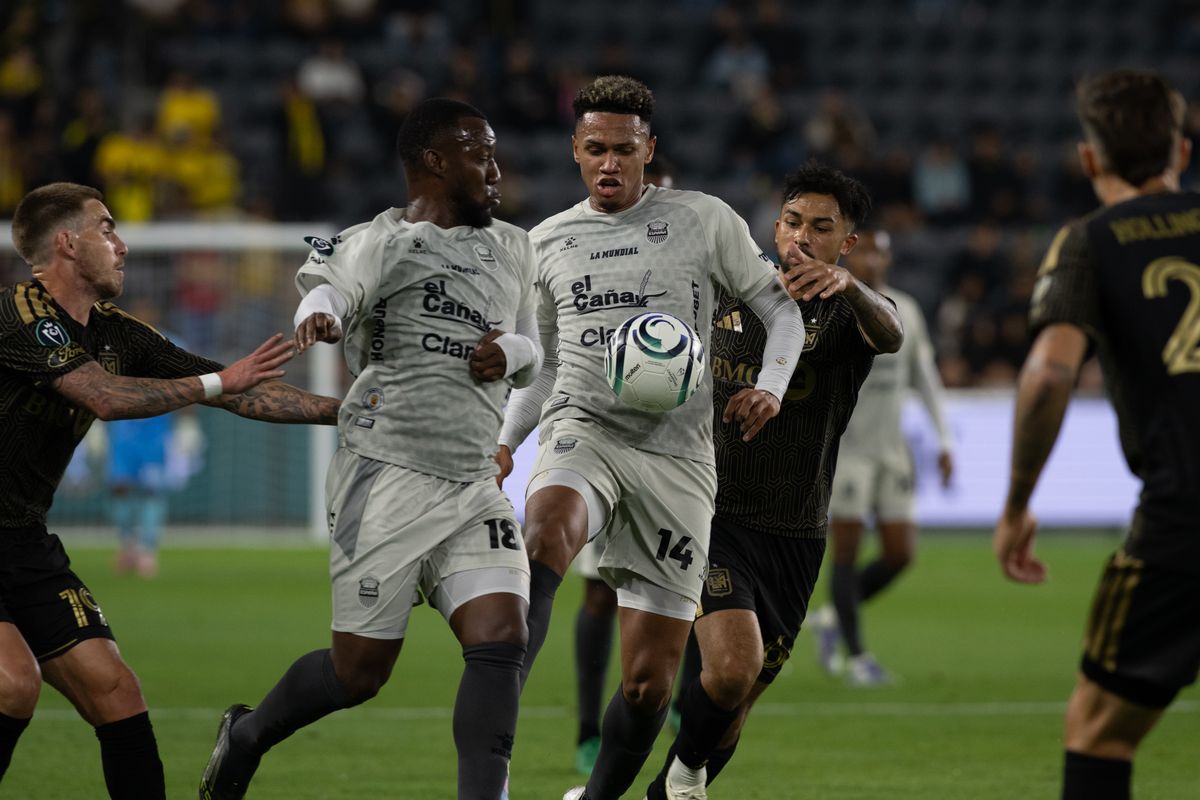 Real Espana midfielder Jack Jean Baptiste (14) controls the ball throuigh traffic during a CONCACAF game between LAFC and Real Espana on Friday, February 24,2026 at BMO Stadium in Los Angeles Calif Real Espana midfielder Jack Jean Baptiste (14) controls the ball throuigh traffic during a CONCACAF game between LAFC and Real Espana on Friday, February 24,2026 at BMO Stadium in Los Angeles Calif