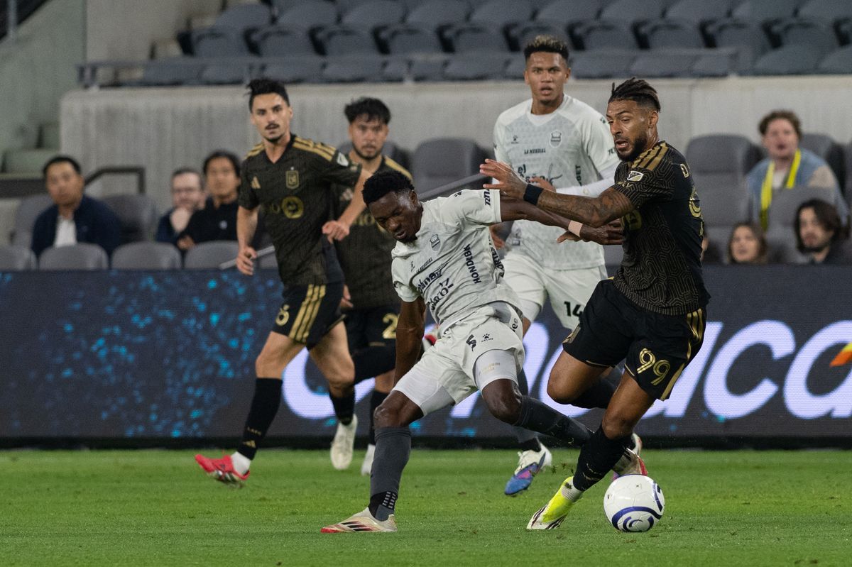 LAFC forward Denis Bouanga (99) gets tackled during a CONCACAF game between LAFC and Real Espana on Friday, February 24,2026 at BMO Stadium in Los Angeles Calif LAFC forward Denis Bouanga (99) gets tackled during a CONCACAF game between LAFC and Real Espana on Friday, February 24,2026 at BMO Stadium in Los Angeles Calif