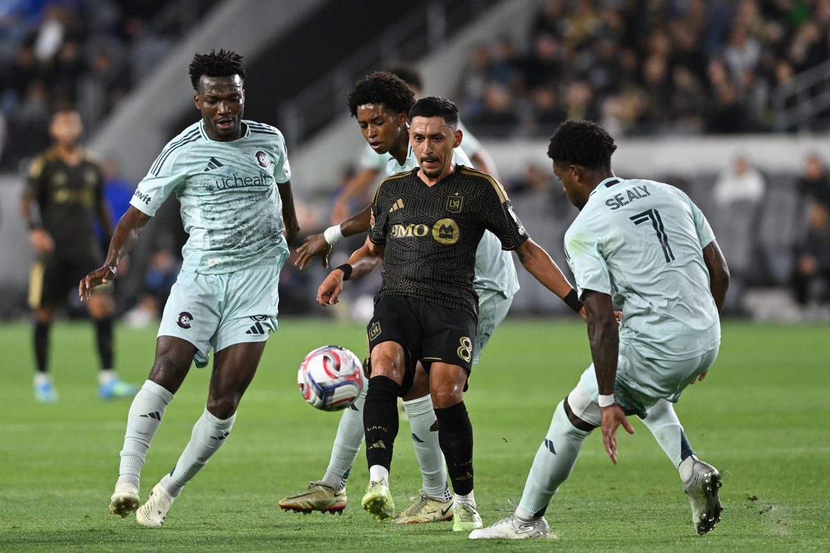 LAFC midfielder Mark Delgado (8) chips the ball away to safety during an MLS game between LAFC and Colorado Rapids on Wednesday, April 22, 2026 at BMO Stadium In Los Angeles Calif at BMO Stadium in Los Angeles Calif LAFC midfielder Mark Delgado (8) chips the ball away to safety during an MLS game between LAFC and Colorado Rapids on Wednesday, April 22, 2026 at BMO Stadium In Los Angeles Calif at BMO Stadium in Los Angeles Calif