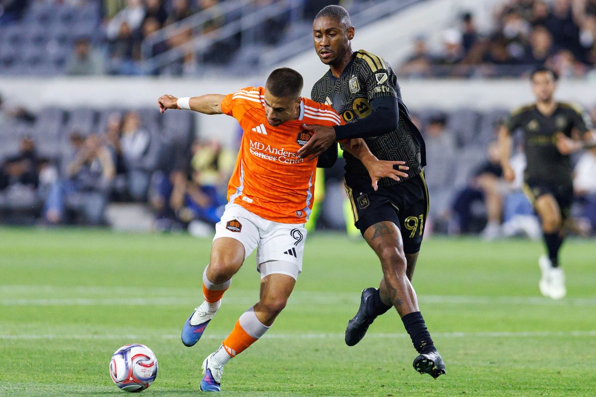 Ondrej Lingr #9 of Houston Dynamo FC gets fouled by Nkosi Tafari #91 of LAFC during an MLS match against LAFC on May 10, 2026 at BMO Stadium in Los Angeles, California. Ondrej Lingr #9 of Houston Dynamo FC gets fouled by Nkosi Tafari #91 of LAFC during an MLS match against LAFC on May 10, 2026 at BMO Stadium in Los Angeles, California.