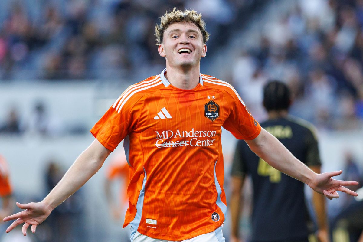 Jack McGlynn #8 of Houston Dynamo FC celebrates after scoring a goal during an MLS match against LAFC on May 10, 2026 at BMO Stadium in Los Angeles, California. Jack McGlynn #8 of Houston Dynamo FC celebrates after scoring a goal during an MLS match against LAFC on May 10, 2026 at BMO Stadium in Los Angeles, California.