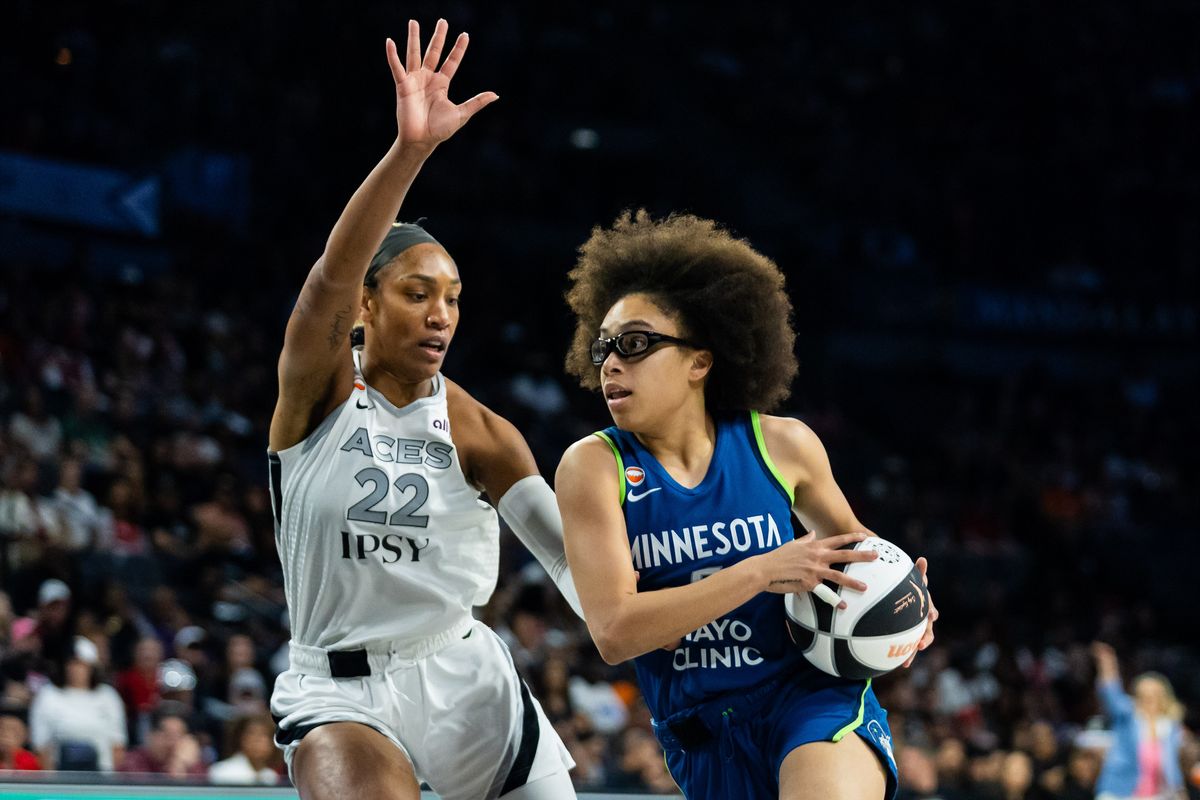 Minnesota Lynx guard Olivia Miles (5) drives to the basket as Las Vegas Aces forward A’ja Wilson (22) defends her during a WNBA game between the Las Vegas Aces and the Minnesota Lynx, Saturday June 13, 2026 in Las Vegas, Nev. Minnesota Lynx guard Olivia Miles (5) drives to the basket as Las Vegas Aces forward A’ja Wilson (22) defends her during a WNBA game between the Las Vegas Aces and the Minnesota Lynx, Saturday June 13, 2026 in Las Vegas, Nev.