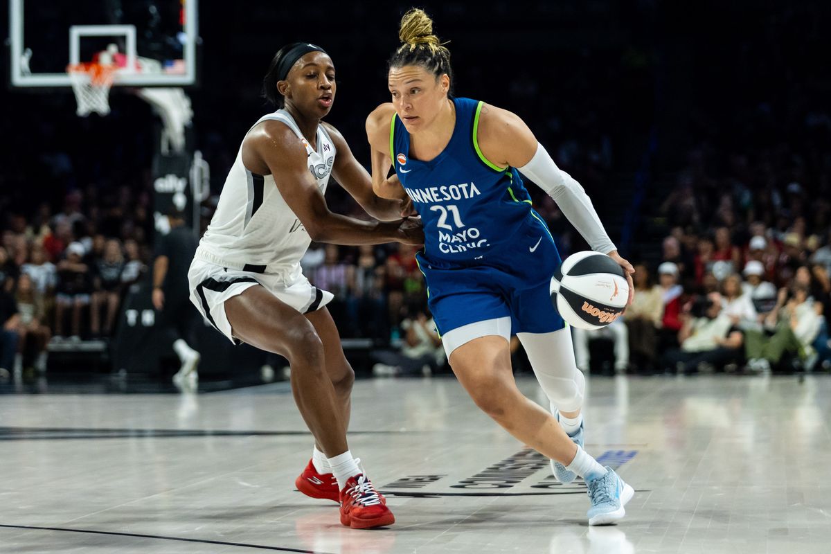 Minnesota Lynx guard Kayla McBride (21) dribbles the ball towards the basket as Las Vegas Aces guard Jackie Young (0) follows her during a WNBA game between the Las Vegas Aces and the Minnesota Lynx, Saturday June 13, 2026 in Las Vegas, Nev. Minnesota Lynx guard Kayla McBride (21) dribbles the ball towards the basket as Las Vegas Aces guard Jackie Young (0) follows her during a WNBA game between the Las Vegas Aces and the Minnesota Lynx, Saturday June 13, 2026 in Las Vegas, Nev.