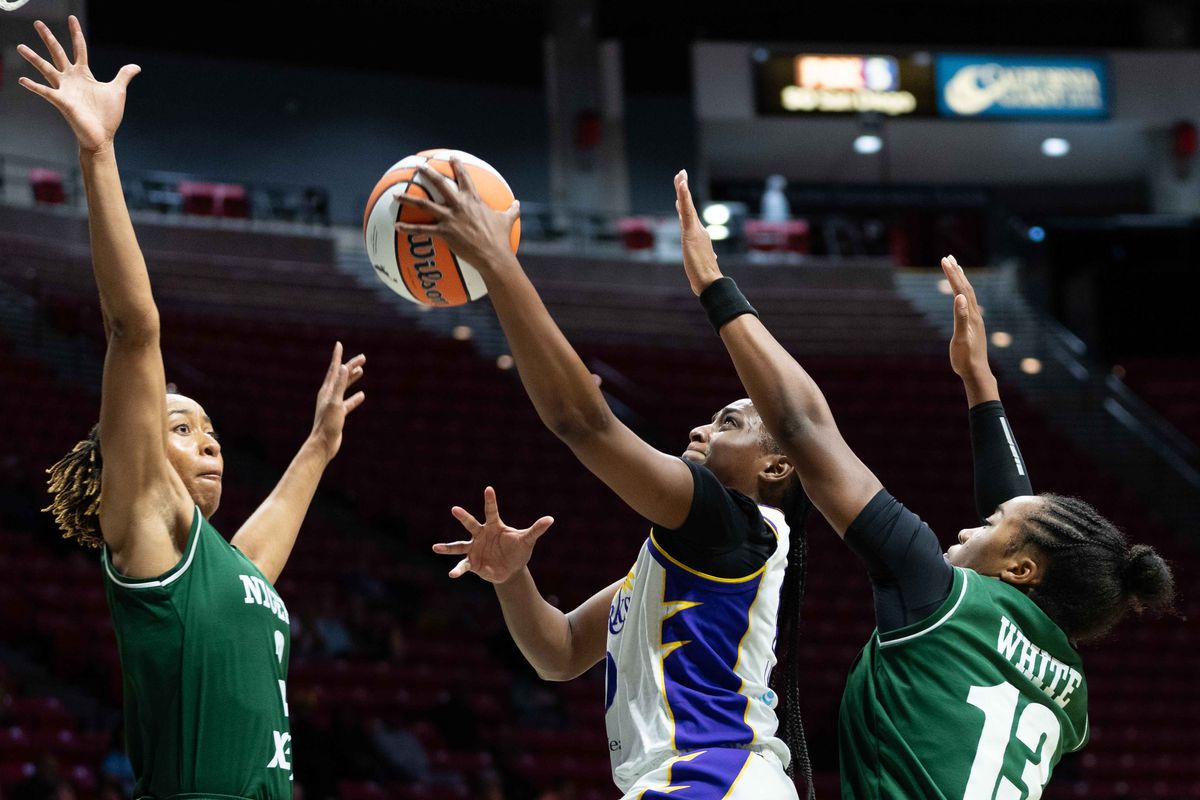LA Sparks guard Ta’Niya Latson (0) takes a lay-up at a WNBA basketball game against Team Nigeria,Saturday April 25th, 2026 in San Diego, California. LA Sparks guard Ta’Niya Latson (0) takes a lay-up at a WNBA basketball game against Team Nigeria,Saturday April 25th, 2026 in San Diego, California.