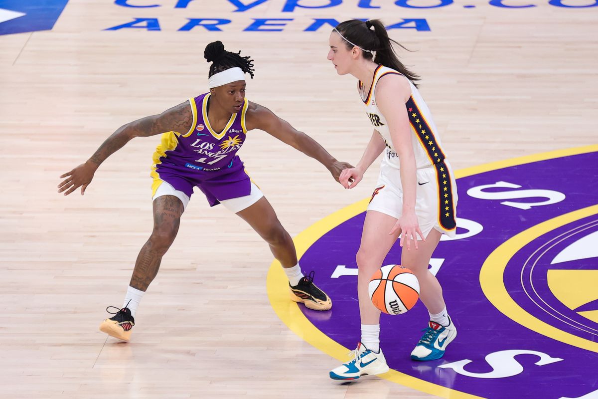 Los Angeles Sparks guard Erica Wheeler (17) guards Indiana Fever guard Caitlin Clark (22) during a WNBA game on May 13, 2026 in Los Angeles, CA. Los Angeles Sparks guard Erica Wheeler (17) guards Indiana Fever guard Caitlin Clark (22) during a WNBA game on May 13, 2026 in Los Angeles, CA.
