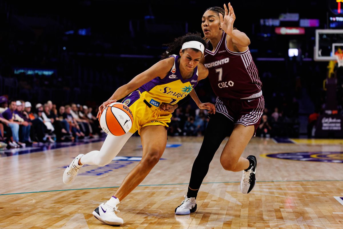 Rae Burrell #12 of the Los Angeles Sparks drives in with the ball during a WNBA game against the Toronto Tempo on May 15, 2026 at Crypto.com Arena in Los Angeles, California. Rae Burrell #12 of the Los Angeles Sparks drives in with the ball during a WNBA game against the Toronto Tempo on May 15, 2026 at Crypto.com Arena in Los Angeles, California.