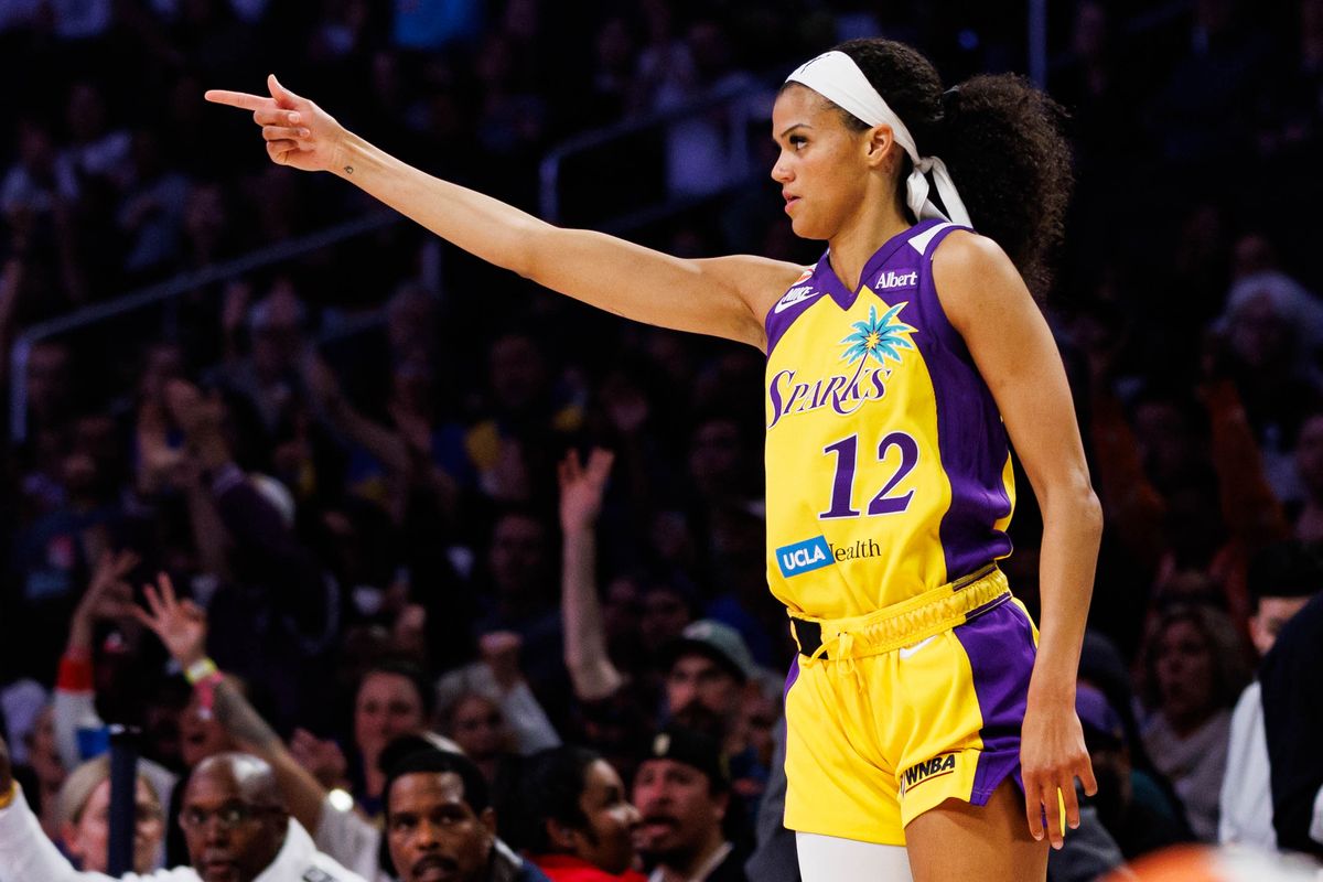Rae Burrell #12 of the Los Angeles Sparks celebrates after making a three pointer during a WNBA game against the Toronto Tempo on May 15, 2026 at Crypto.com Arena in Los Angeles, California. Rae Burrell #12 of the Los Angeles Sparks celebrates after making a three pointer during a WNBA game against the Toronto Tempo on May 15, 2026 at Crypto.com Arena in Los Angeles, California.