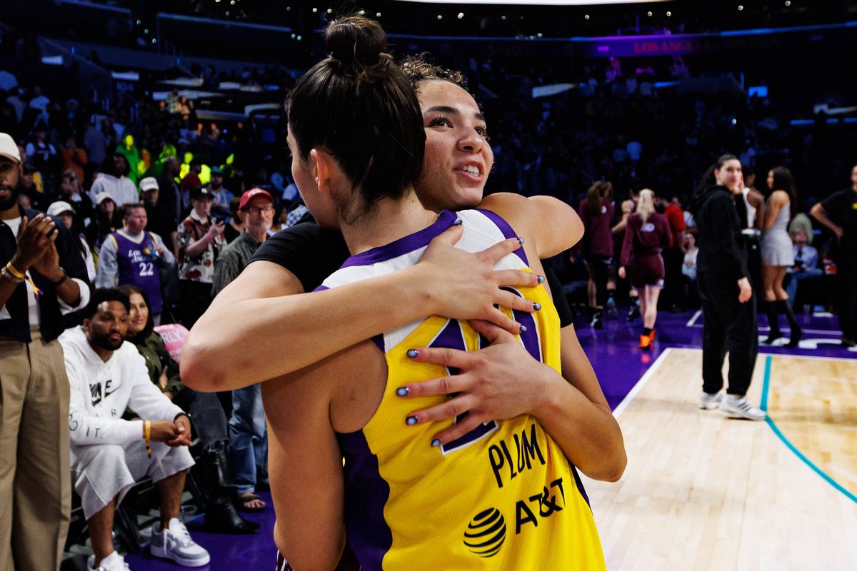 Kelsey Plum #10 of the Los Angeles Sparks hugs Kiki Rice #1 of the Toronto Tempo after a WNBA game against the Toronto Tempo on May 15, 2026 at Crypto.com Arena in Los Angeles, California. Kelsey Plum #10 of the Los Angeles Sparks hugs Kiki Rice #1 of the Toronto Tempo after a WNBA game against the Toronto Tempo on May 15, 2026 at Crypto.com Arena in Los Angeles, California.
