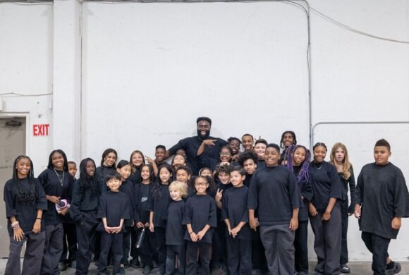 Boston Celtics wing Jaylen Brown poses with students at Ye's Donda Academy.